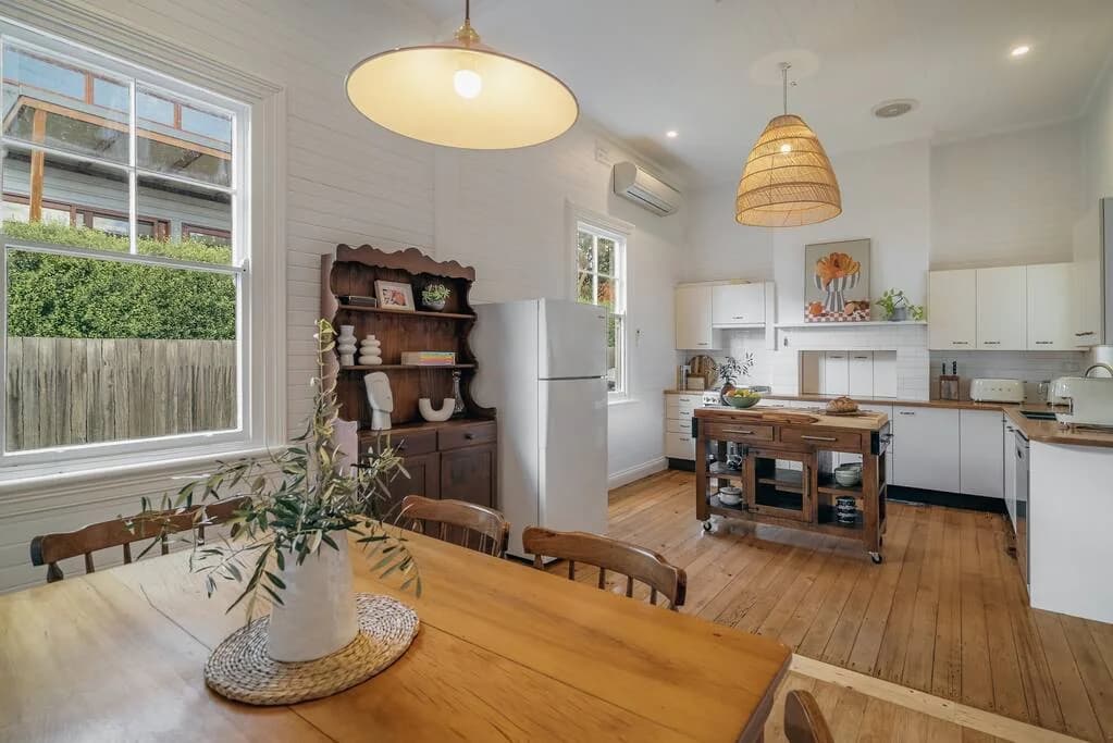 Dining area flowing into the kitchen at Quinn’s Cottage